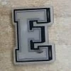 "E" Rubber Shoe Charms